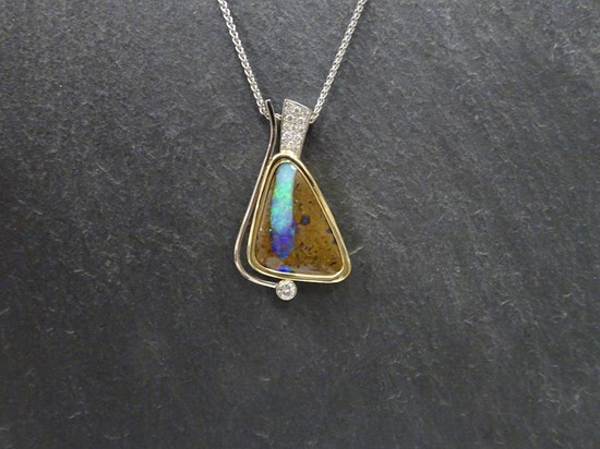 Boulder Opal in White & Yellow Gold with Pave Diamonds and a Bezel Set Canadian Solitaire Diamond Image