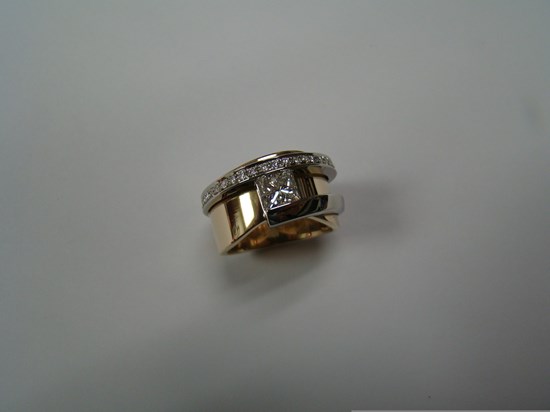 Princess Cut Diamond Ring in a Yellow and White Gold Diamond Setting Image