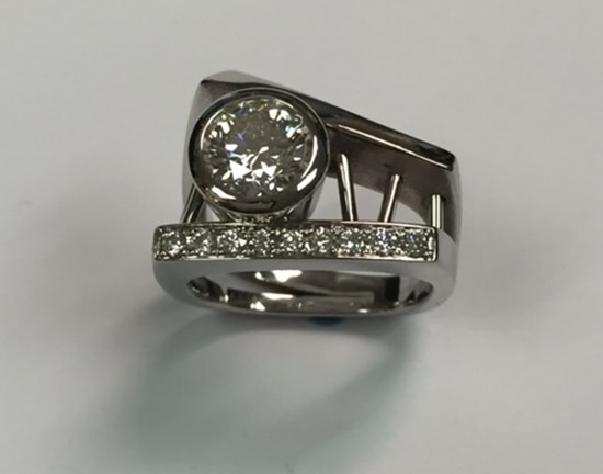 Bezel Set Round Diamond Ring in a White Gold Stacked Setting with Channel Set Diamonds Image