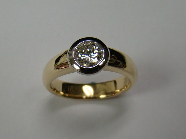 Bezel Set Diamond in White and Yellow Gold Ring Image